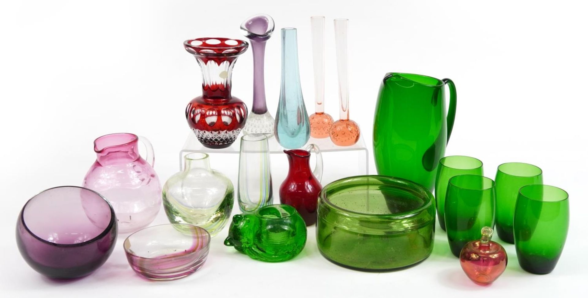 Art glassware including Whitefriars green glass lemonade jug with four beakers, red overlaid glass