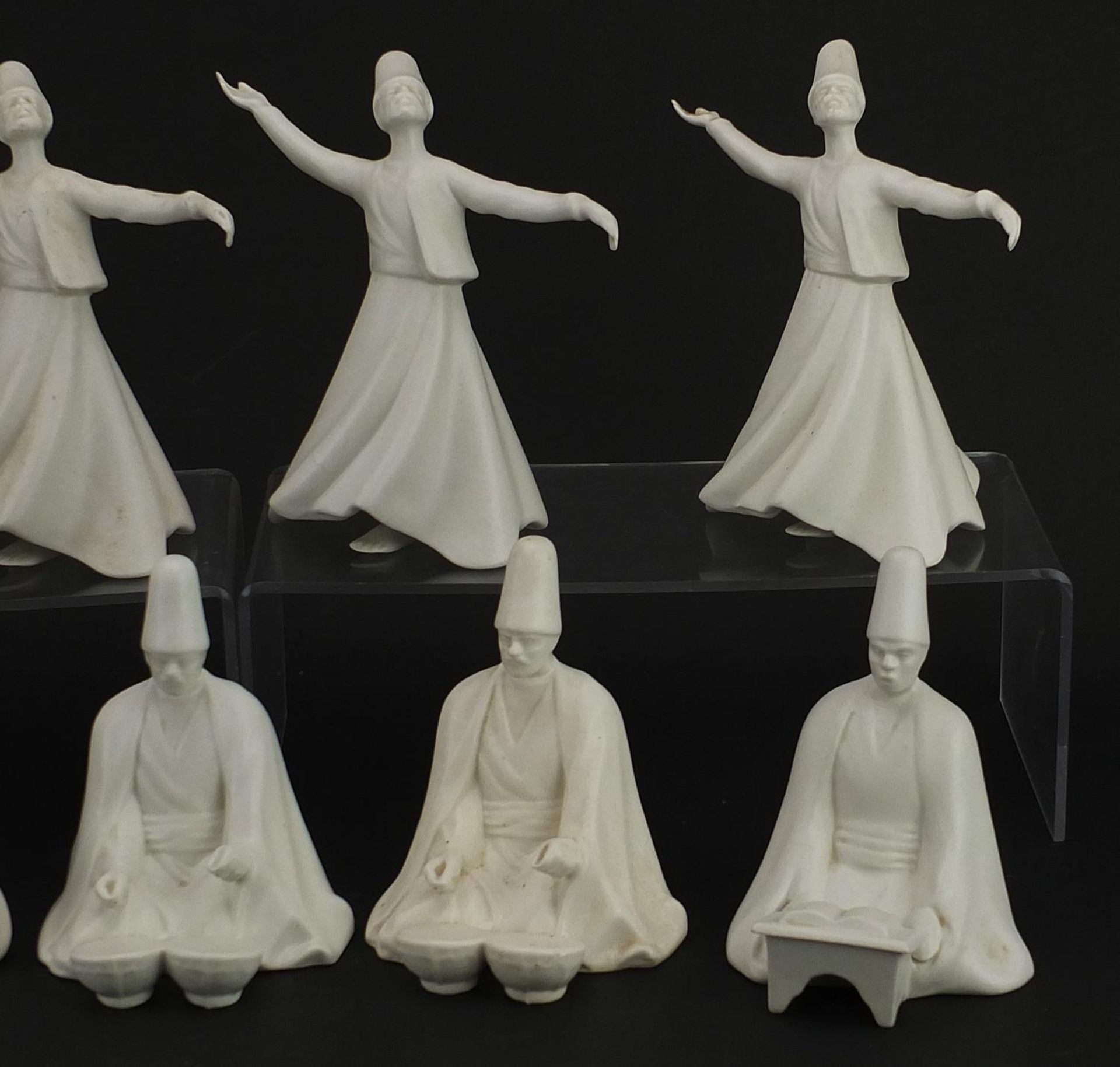 Nine Turkish porcelain whirling dervish figures, each with painted factory marks to the bases, the - Bild 3 aus 4