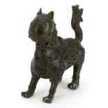 Islamic patinated bronze incense burner with hinged head in the form of a mythical animal, 17.5cm in