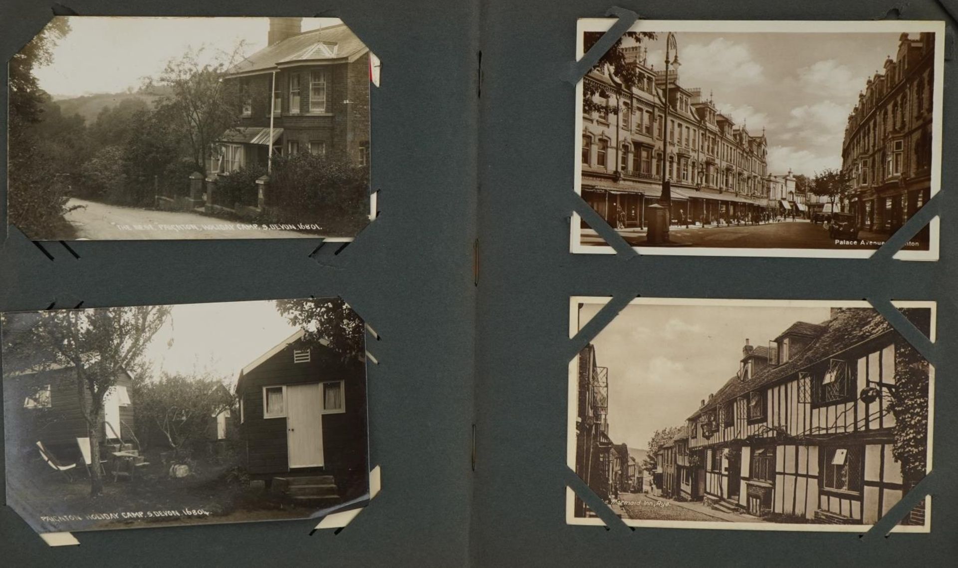 Edwardian and later postcards arranged in an album, some photographic including Hastings, Dunster,