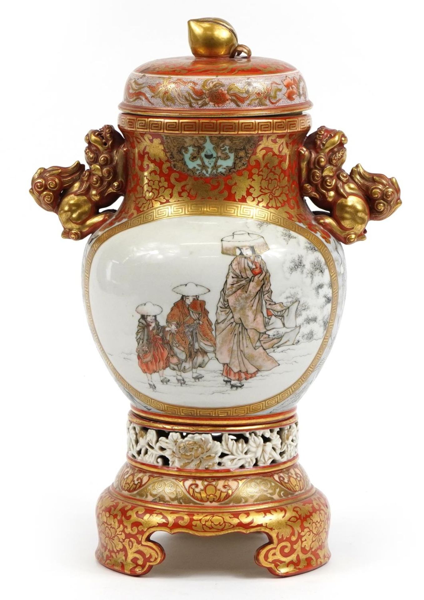 Japanese Kutani porcelain lidded vase with twin handles raised on a stand, finely hand painted
