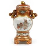 Japanese Kutani porcelain lidded vase with twin handles raised on a stand, finely hand painted