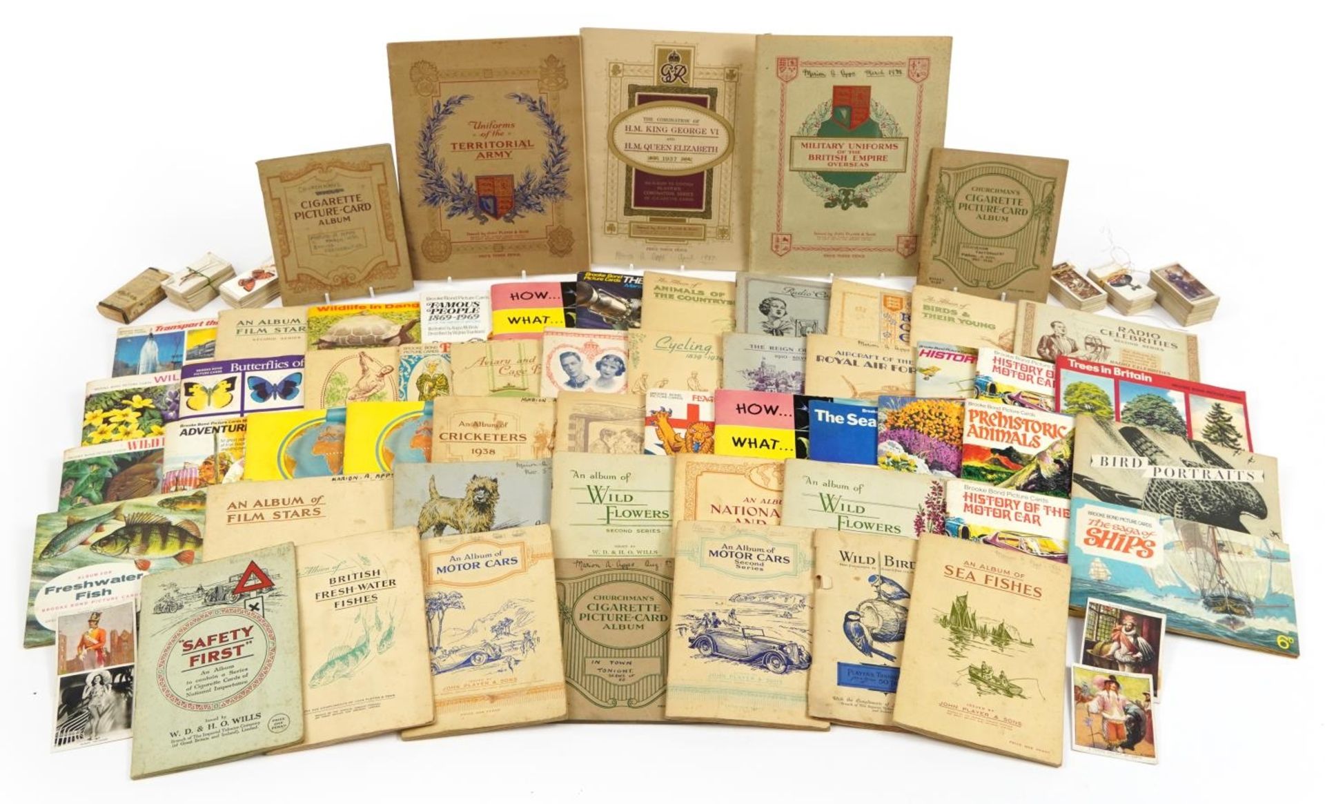 Large collection of cigarette cards, mostly arranged in albums, including John Players & Sons,