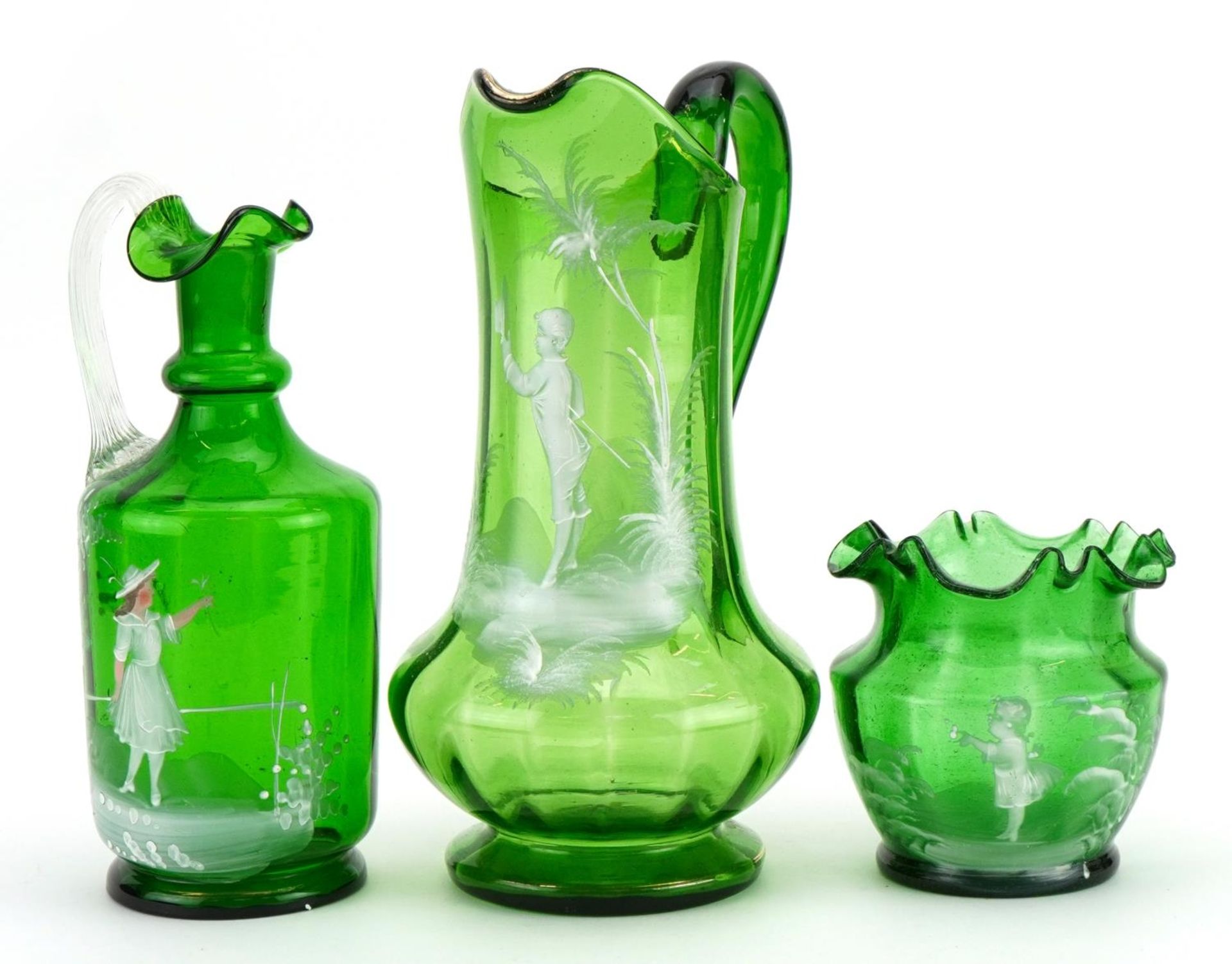 Two Victorian Mary Gregory green glass jugs and a frilled vase hand painted with young children, the