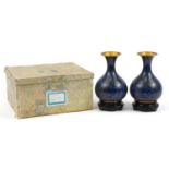 Pair of Chinese cloisonne vases with hardwood stands and box, each vase enamelled with flowers, each