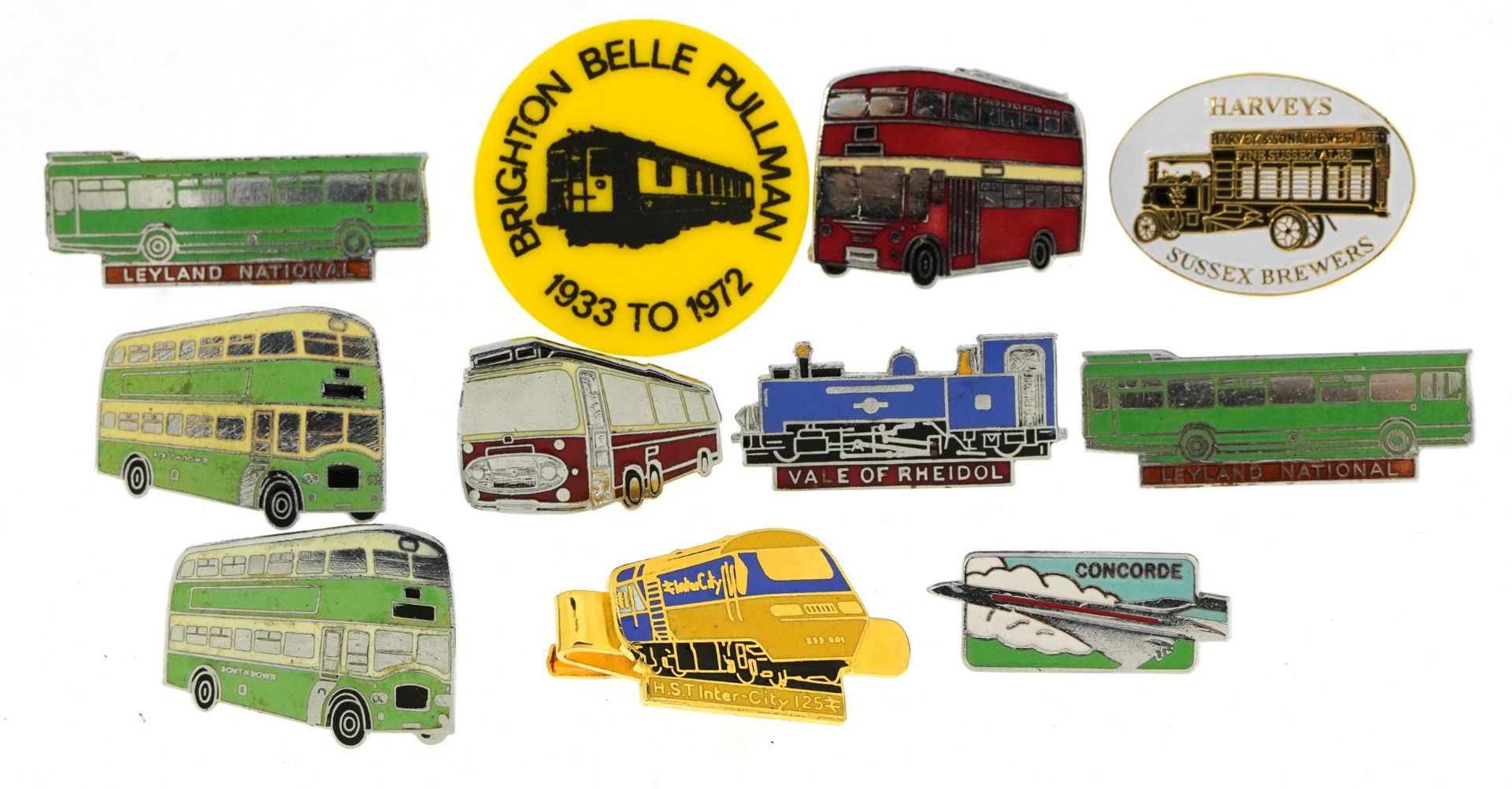 Nine enamelled metal badges and one other including Concorde, buses and trains, the largest 4.5cm in