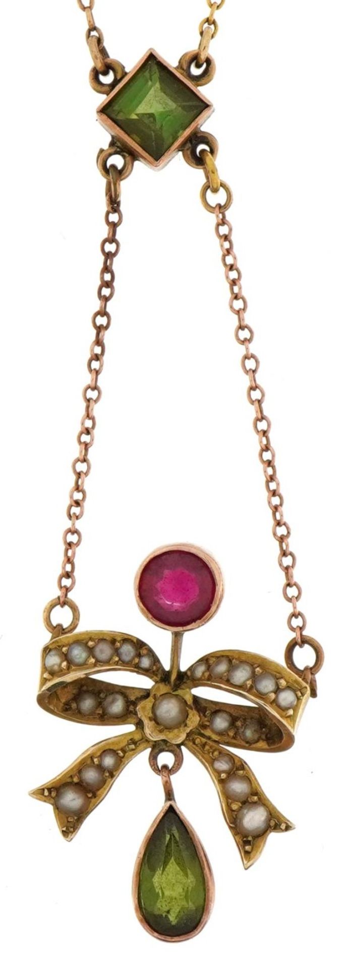 Victorian unmarked gold green stone, ruby and seed pearl bow design necklace, the green stone