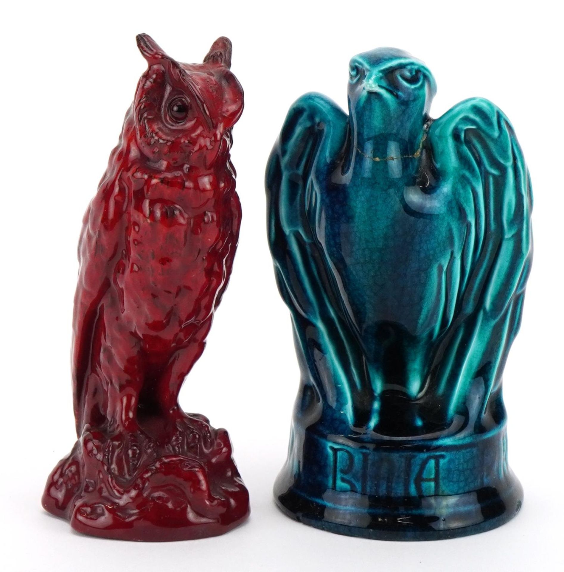 Two Bernard Moore figures comprising a red glazed owl and a blue glazed bird, the largest 12.5cm