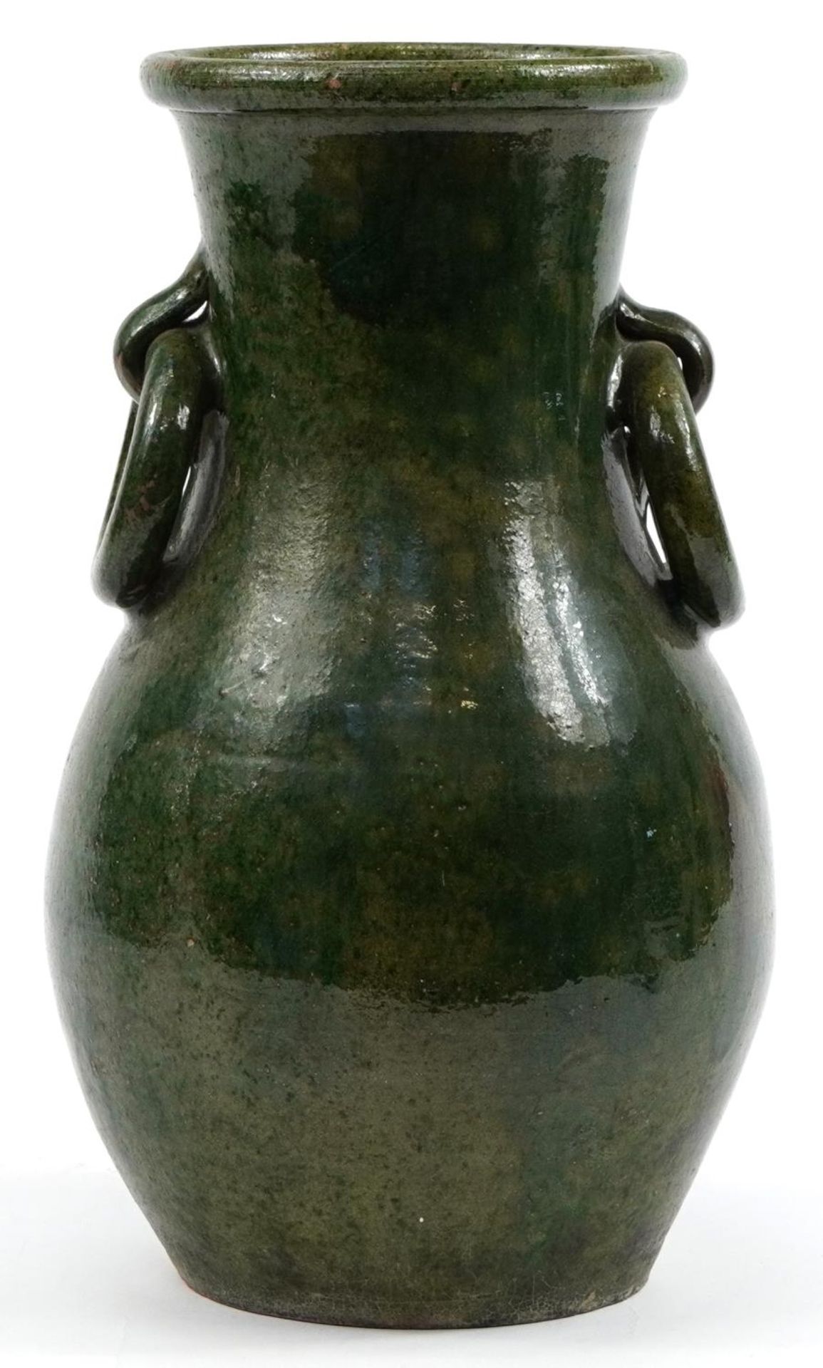 Large green glazed pot with ring turned handles, 45cm high