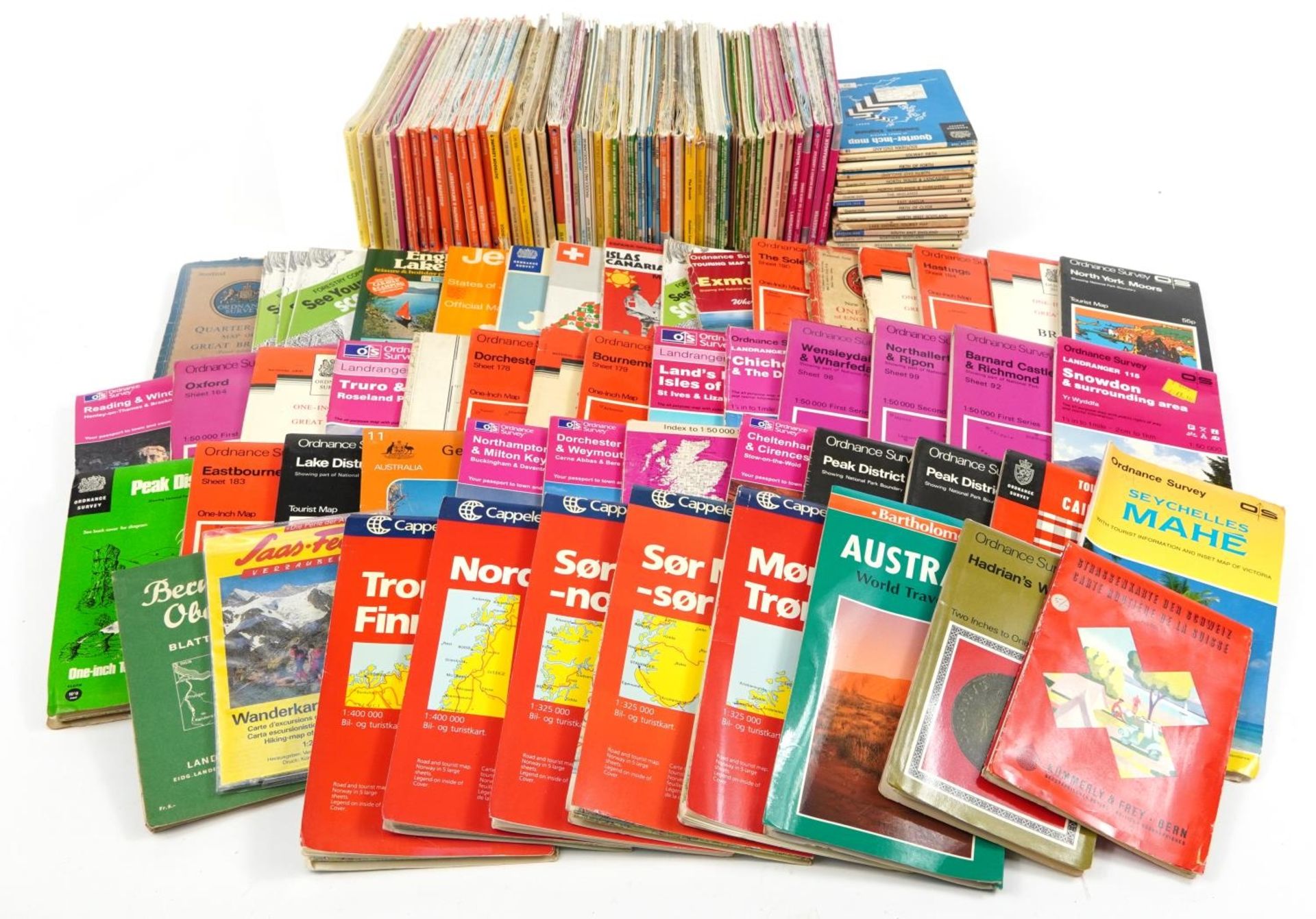 Large quantity of fold out maps including The Cotswolds, Falmouth, Cornwall, Eastbourne, Snowdon,