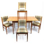 Gordon Russell extending dining table with four chairs, 77cm H x 107cm W x 78cm D