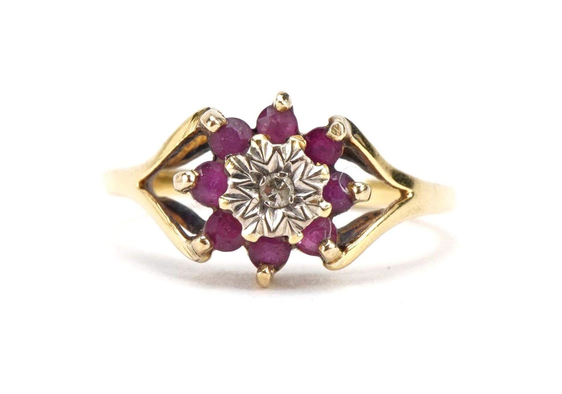 18ct gold diamond and ruby two tier flower head ring, size M, 2.9g