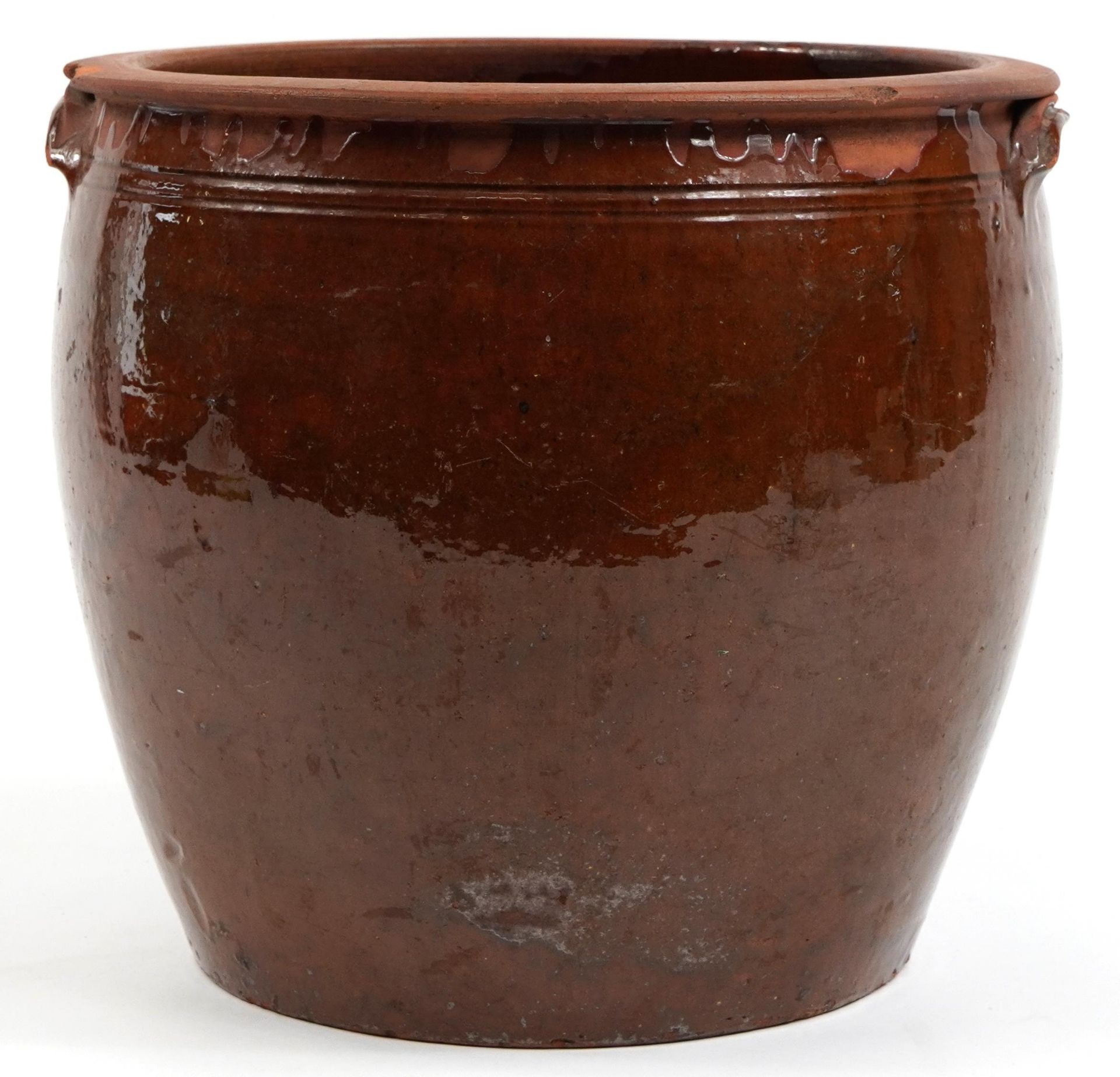 Large treacle glazed terracotta planter with twin handles, 32.5cm high x 36.5cm in diameter