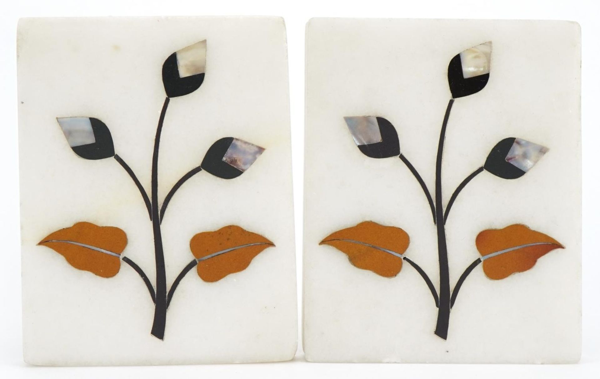 Pair of Italian pietra dura plaques inlaid with flowers, each 9.5cm x 7.5cm