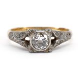 18ct gold and platinum diamond ring with diamond set shoulders, the central diamond approximately