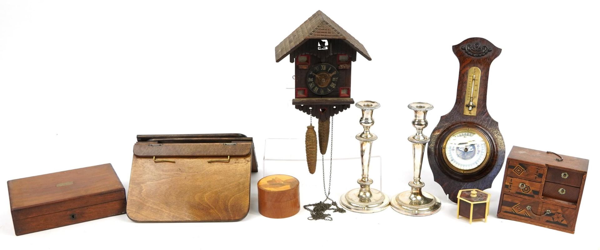 Sundry items including a carved Black Forest cuckoo clock, pair of silver plated candlesticks and an