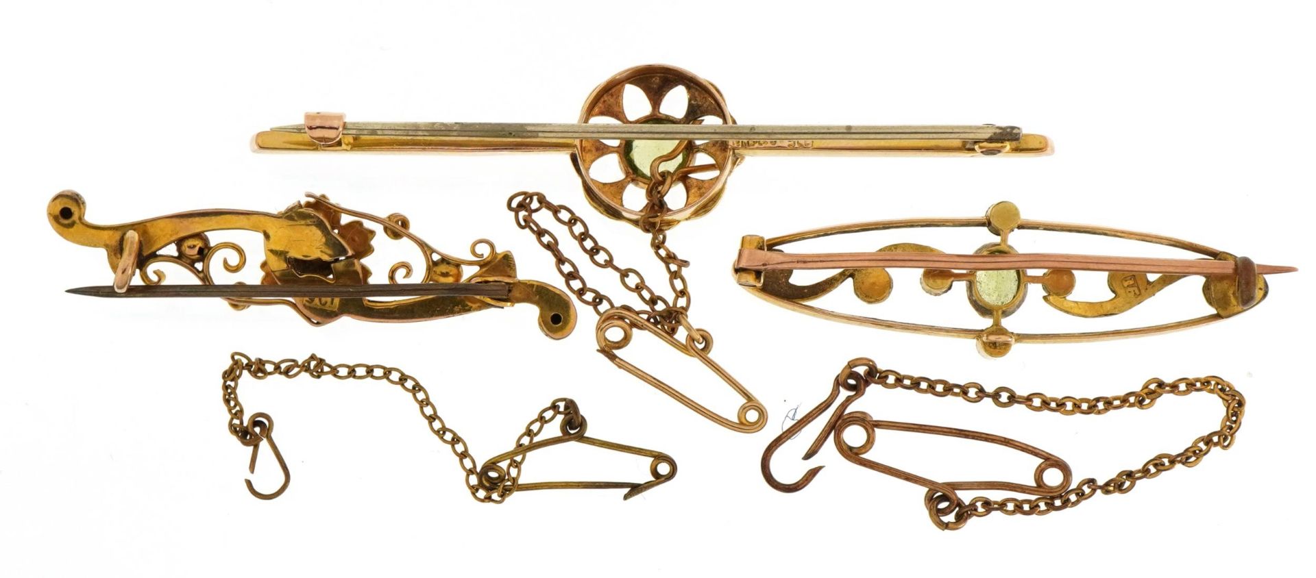 Three antique and later 9ct gold bar brooches with safety chains set with seed pearls, peridots - Image 2 of 3
