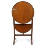 Art Deco oak tilt top folding occasional table with undertier, 69.5cm high x 48cm in diameter