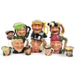 Six large and five small Royal Doulton Toby jugs including Sairey Gamp D5451, Lumberjack D6610,