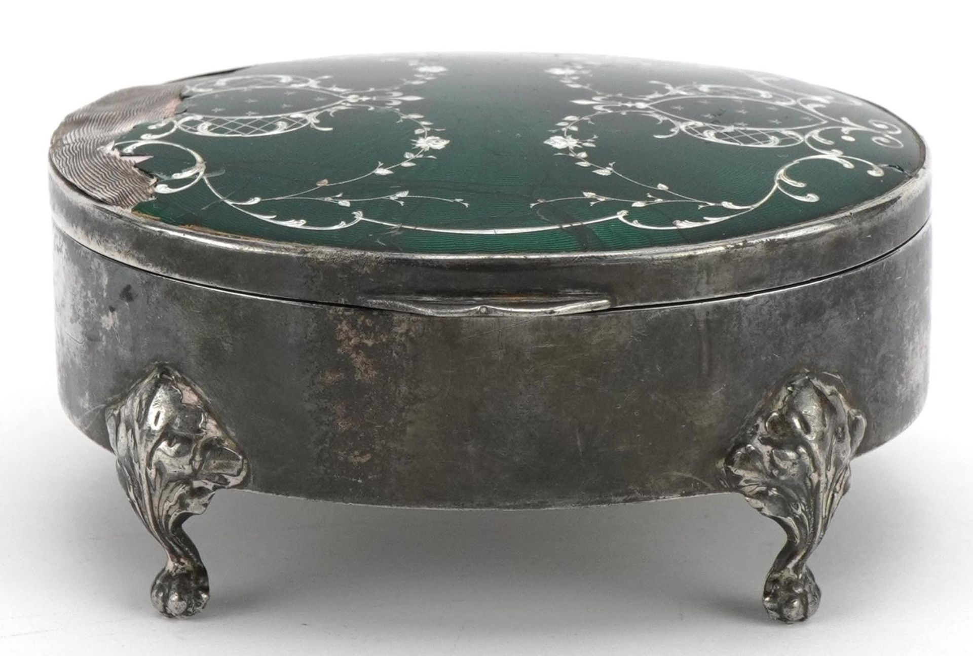 Charles Edwin Turner oval silver and enamel jewel box raised on four feet, Birmingham 1910, 9cm wide