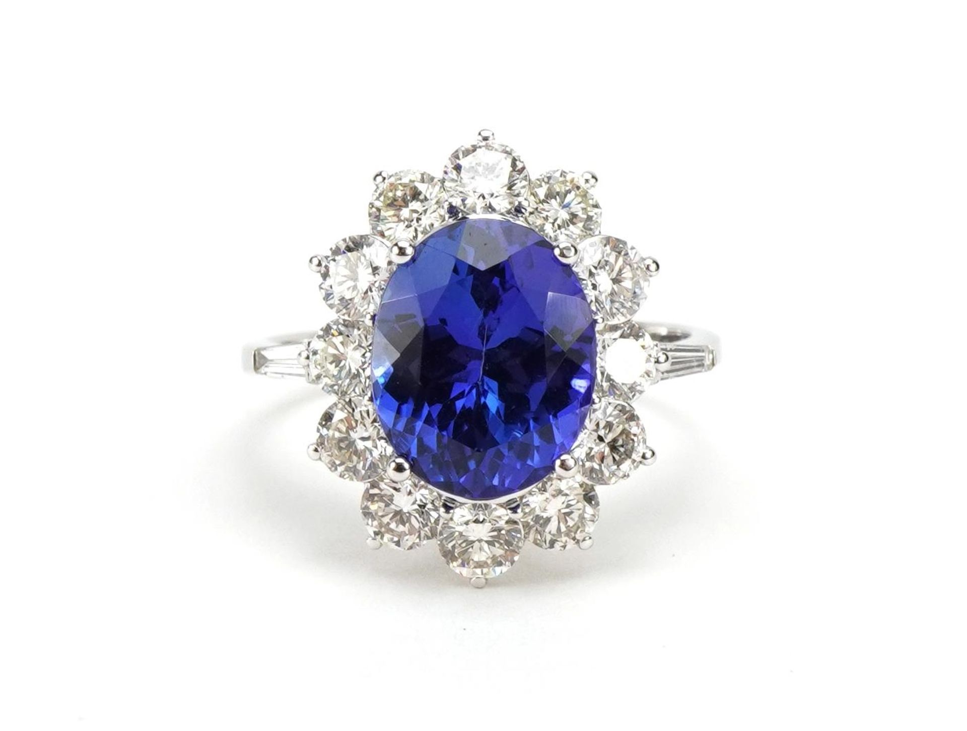 18ct white gold tanzanite and diamond cluster ring with baguette cut shoulders, total tanzanite