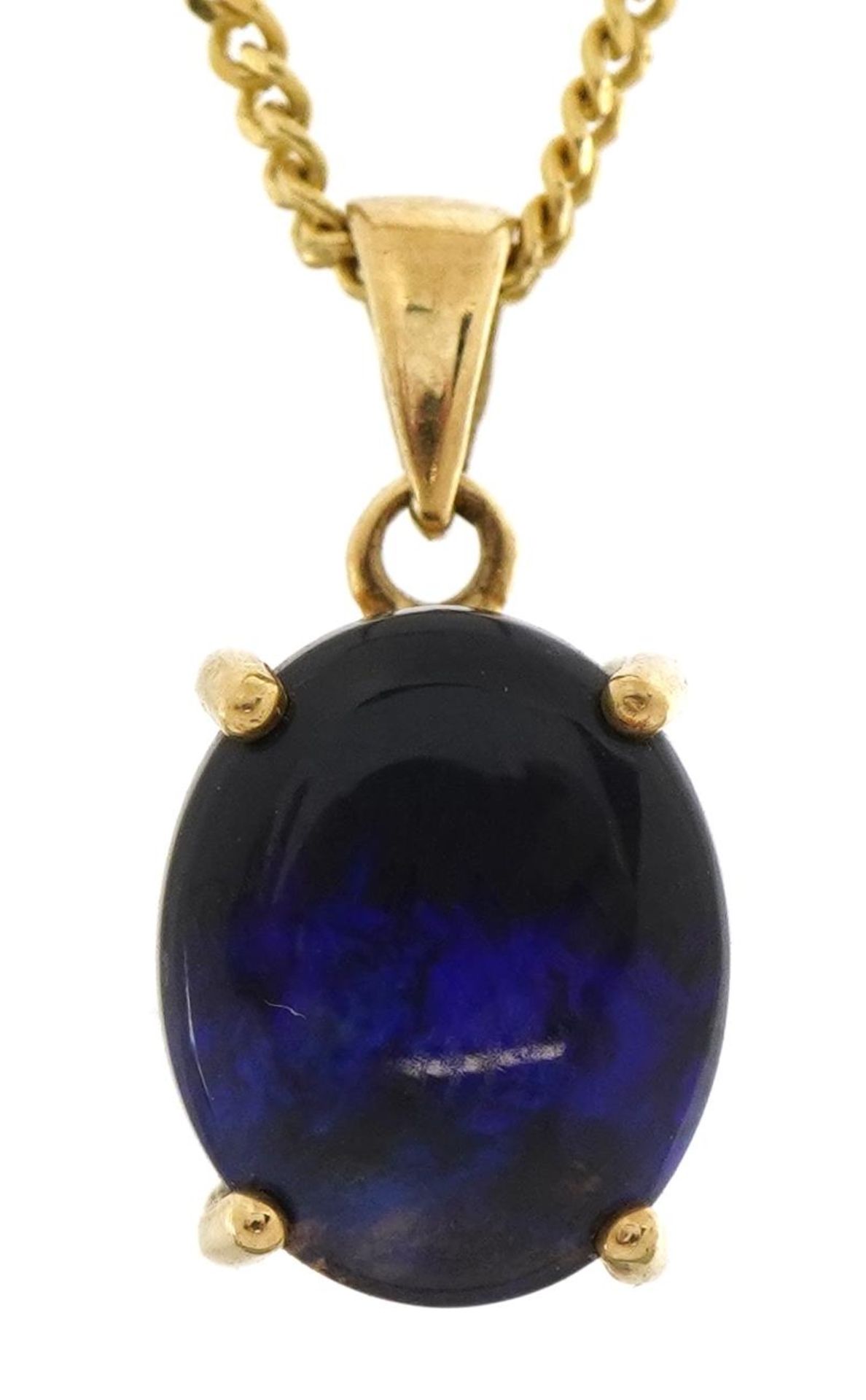 9ct gold blue stone pendant on an 18ct gold curb link necklace, 1.8cm high and 50.5cm in length,