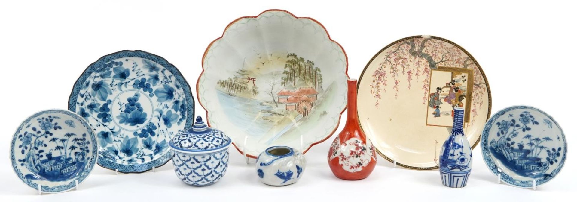 Chinese and Japanese ceramics including a pair of blue and white dishes hand painted with flowers