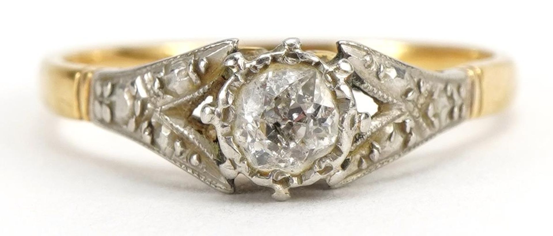 Unmarked gold diamond solitaire ring with split shoulders, the diamond approximately 4.1mm in
