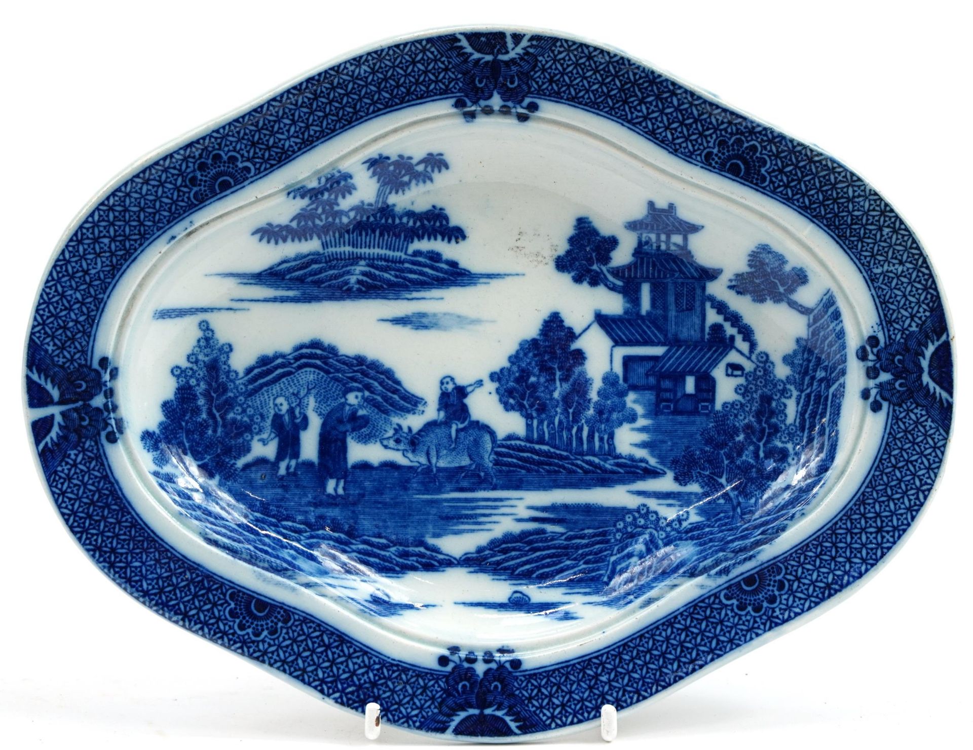 19th century pearlware footed stand printed in the chinoiserie manner with farmers and a pagoda,