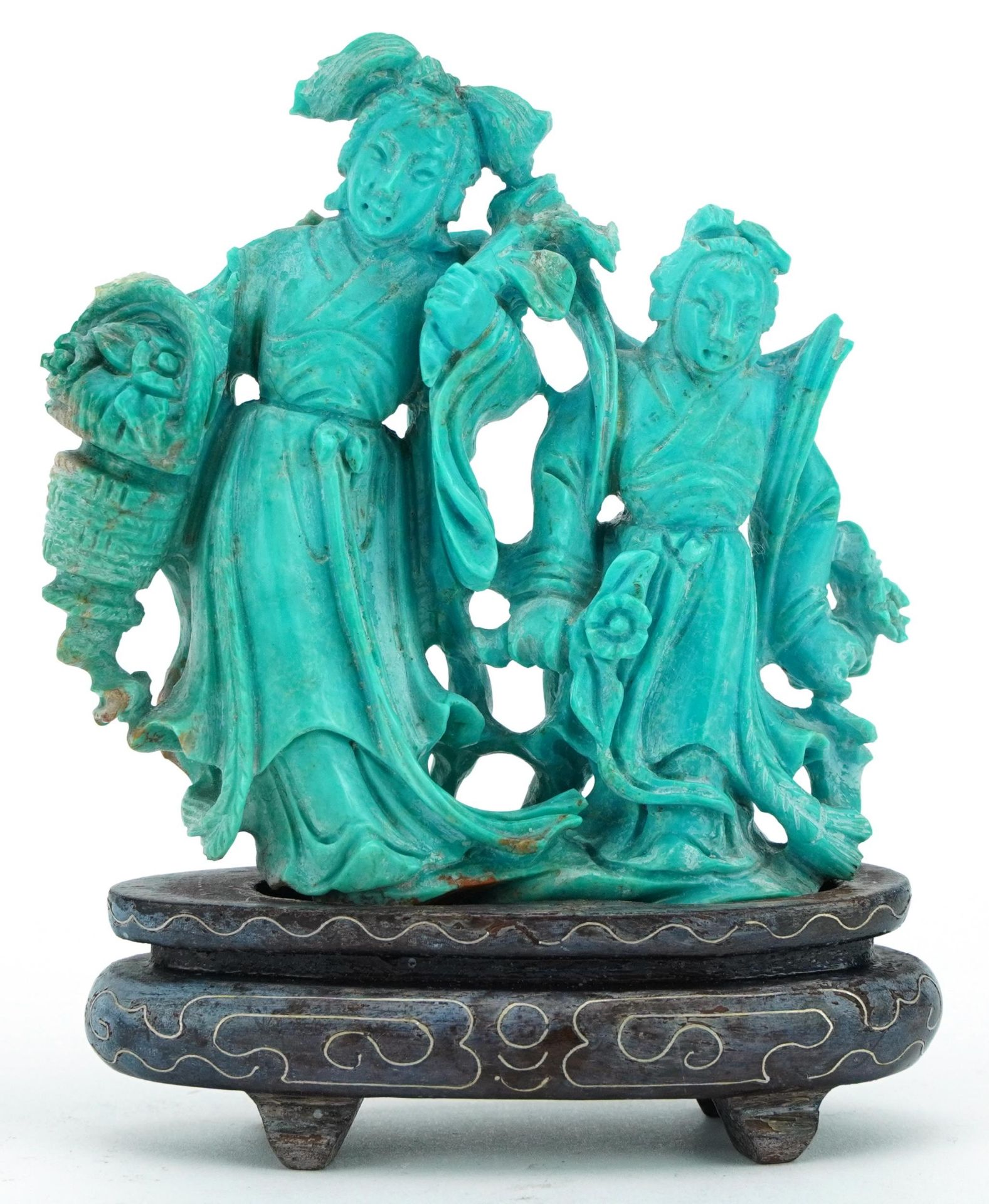 Chinese turquoise carving of two females raised on a hardwood stand with white metal inlay, 11cm