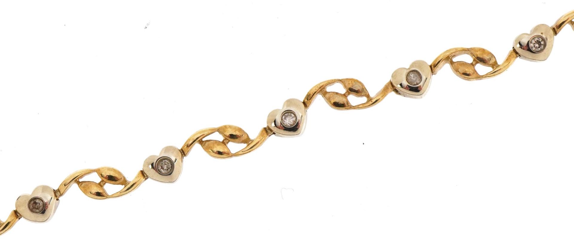 10ct two tone gold love heart bracelet set with diamonds 18.5cm in length, 5.5g