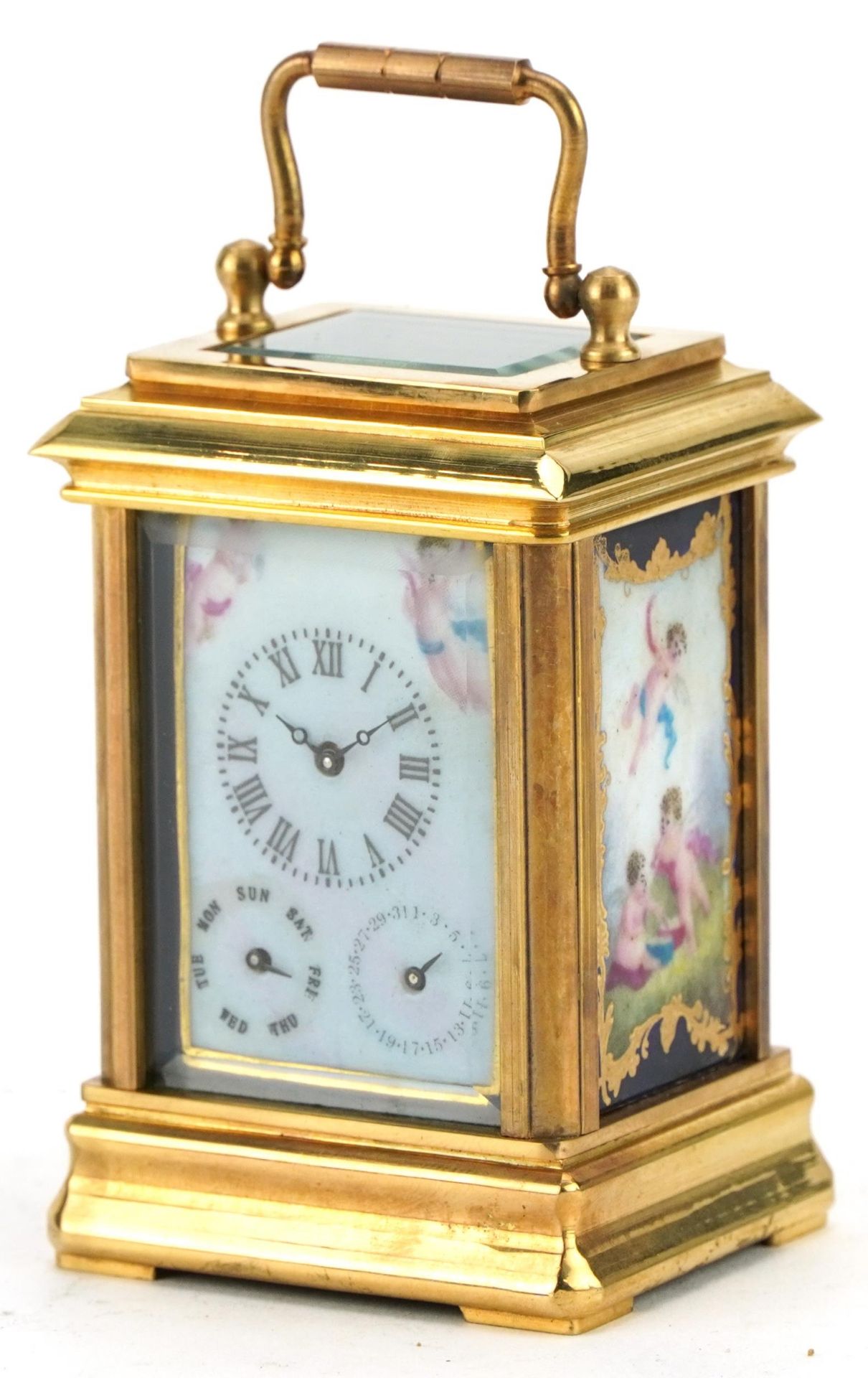 Miniature brass carriage clock with Sevres type panels and Roman numerals, 8.5cm high