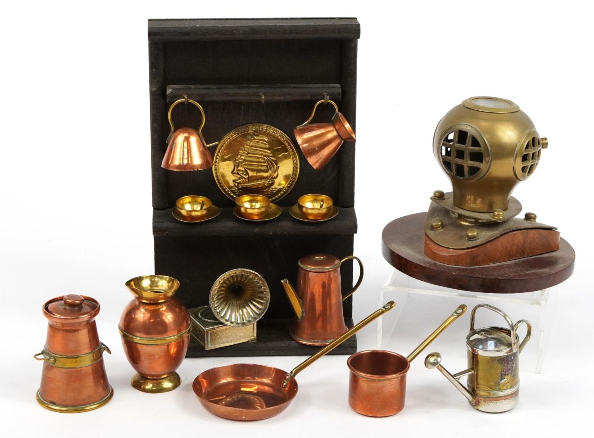 Objects including miniature copper and brass doll's house accessories and a brass diver's helmet