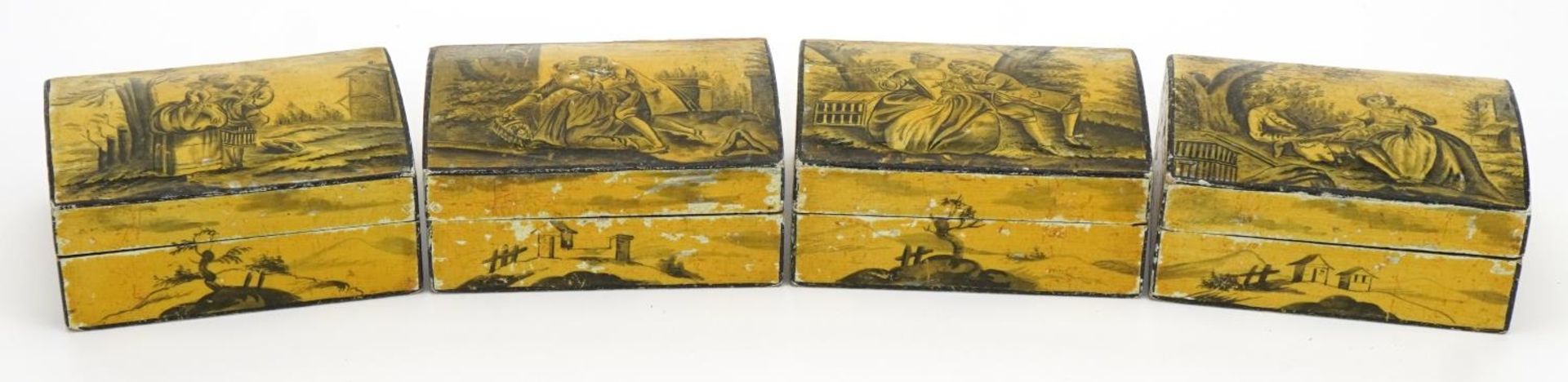 Four 19th century continental lacquered dome top boxes hand painted with classical figures in
