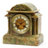 Green onyx mantle clock with brass column supports and mounts, the enamelled chapter ring having
