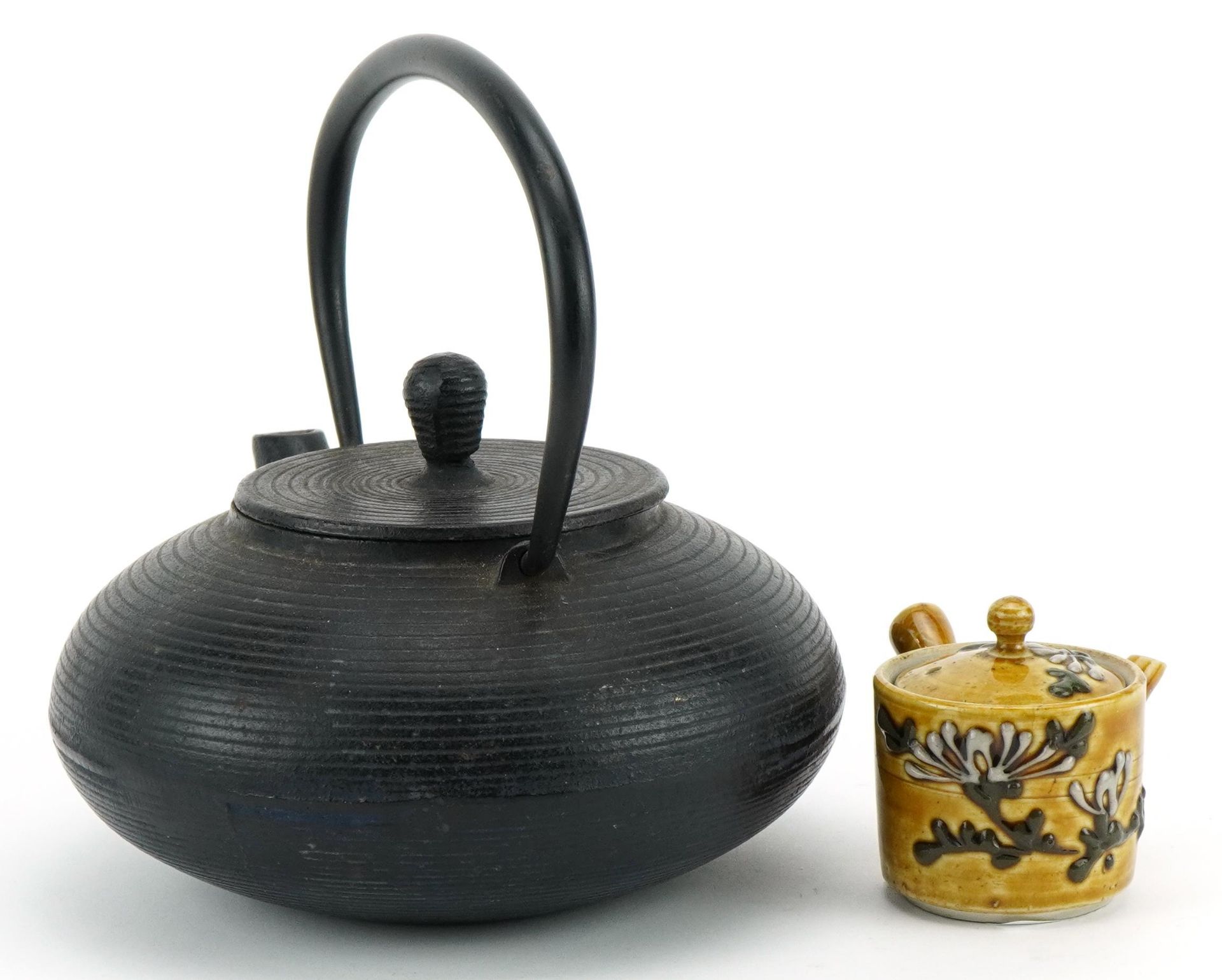 Oriental cast iron teapot and a pottery example, the largest 18cm in length - Image 2 of 4