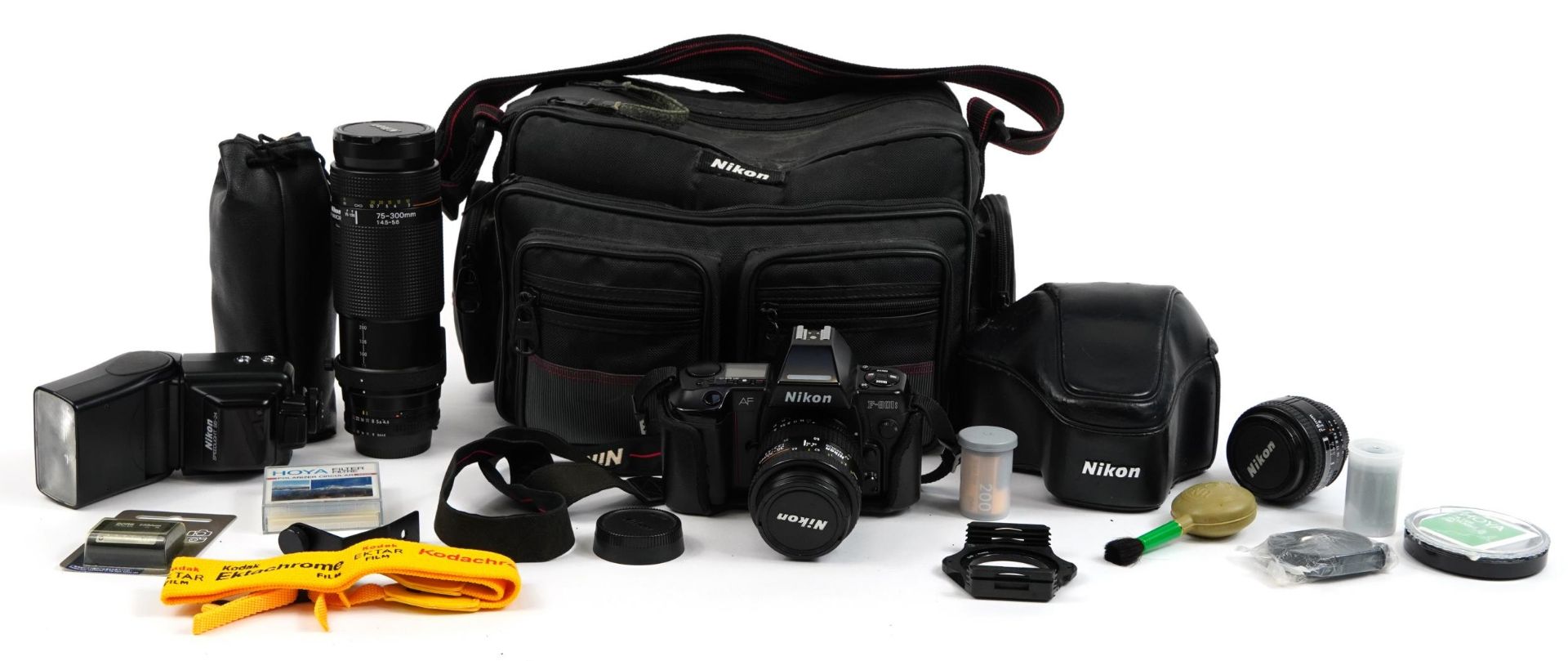 Nikon F-801S camera with lenses and accessories including 28mm lens and 75-300mm lens