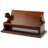Victorian mahogany bookrest in the form of a bench, 30.5cm wide