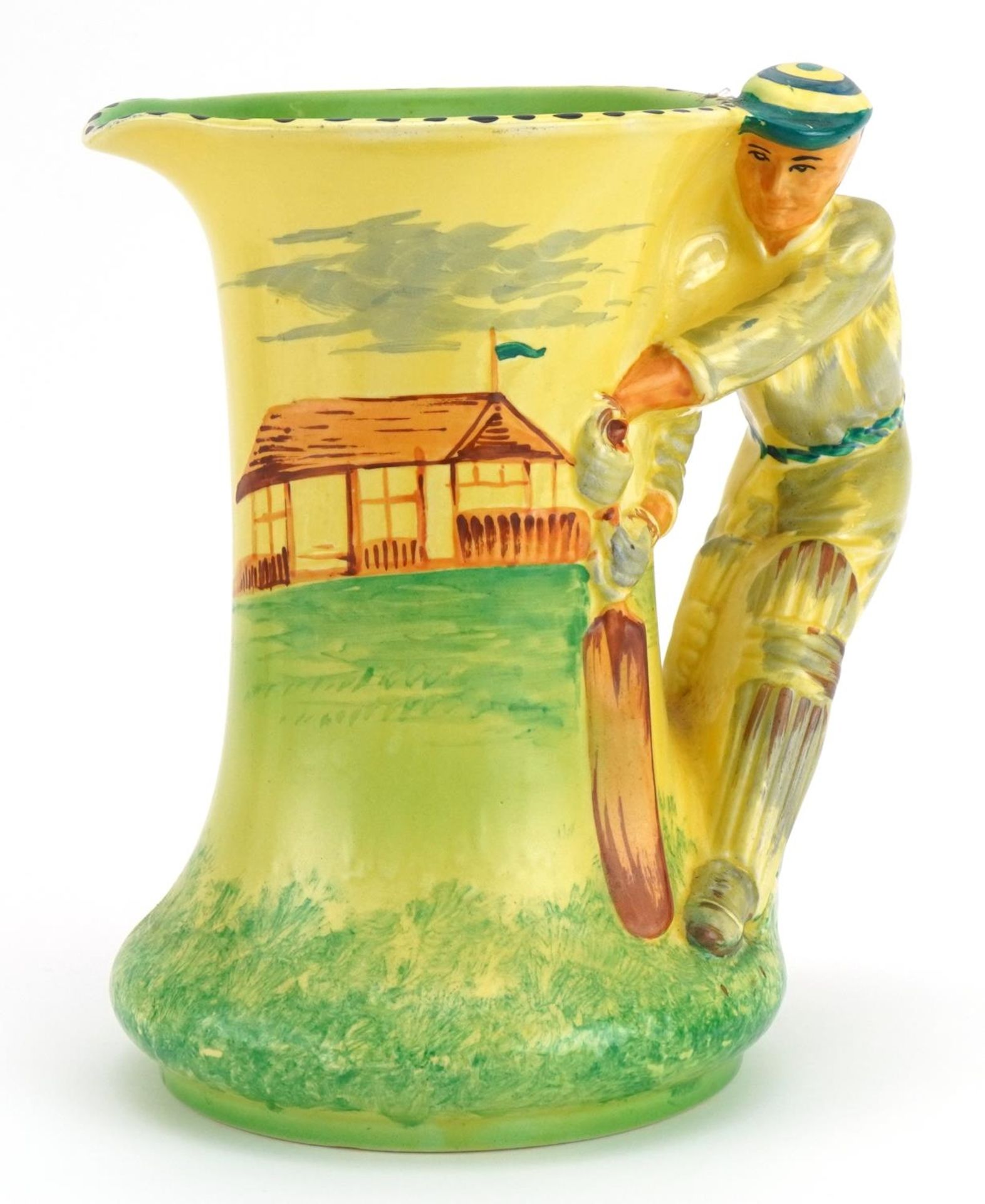 Cricketing interest Burleigh Ware jug with handle in the form of a cricketer, 19.5cm high