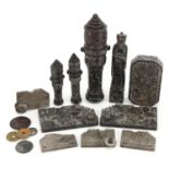 Three Chinese carved soapstone cannons and a figure, the largest 17.5cm in length