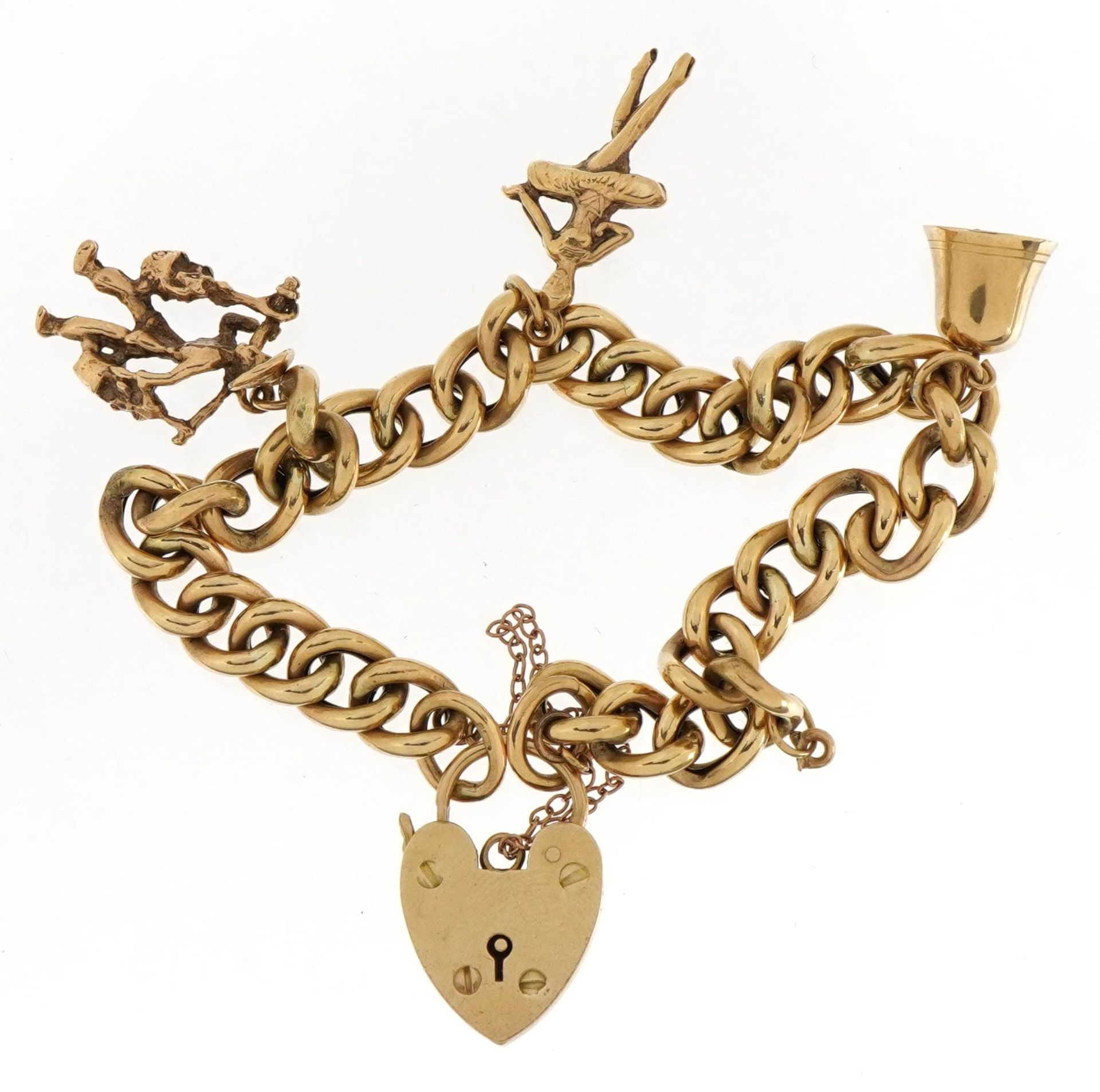 9ct gold charm bracelet with love heart padlock and three 9ct gold charms, total weight 14.5g