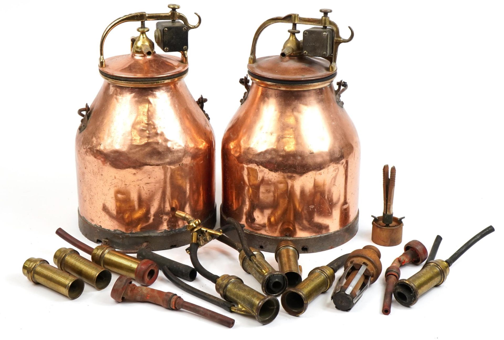 Pair of copper and brass milk churns with swing handles, each 51.5cm high