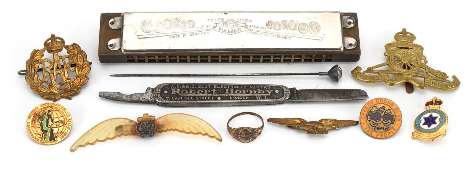 Objects including RAF military badges, Song Band harmonica, Robert Hornby folding pocket knife and