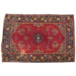 Rectangular Chinese red and blue ground rug having an all over floral design, 192cm x 134cm