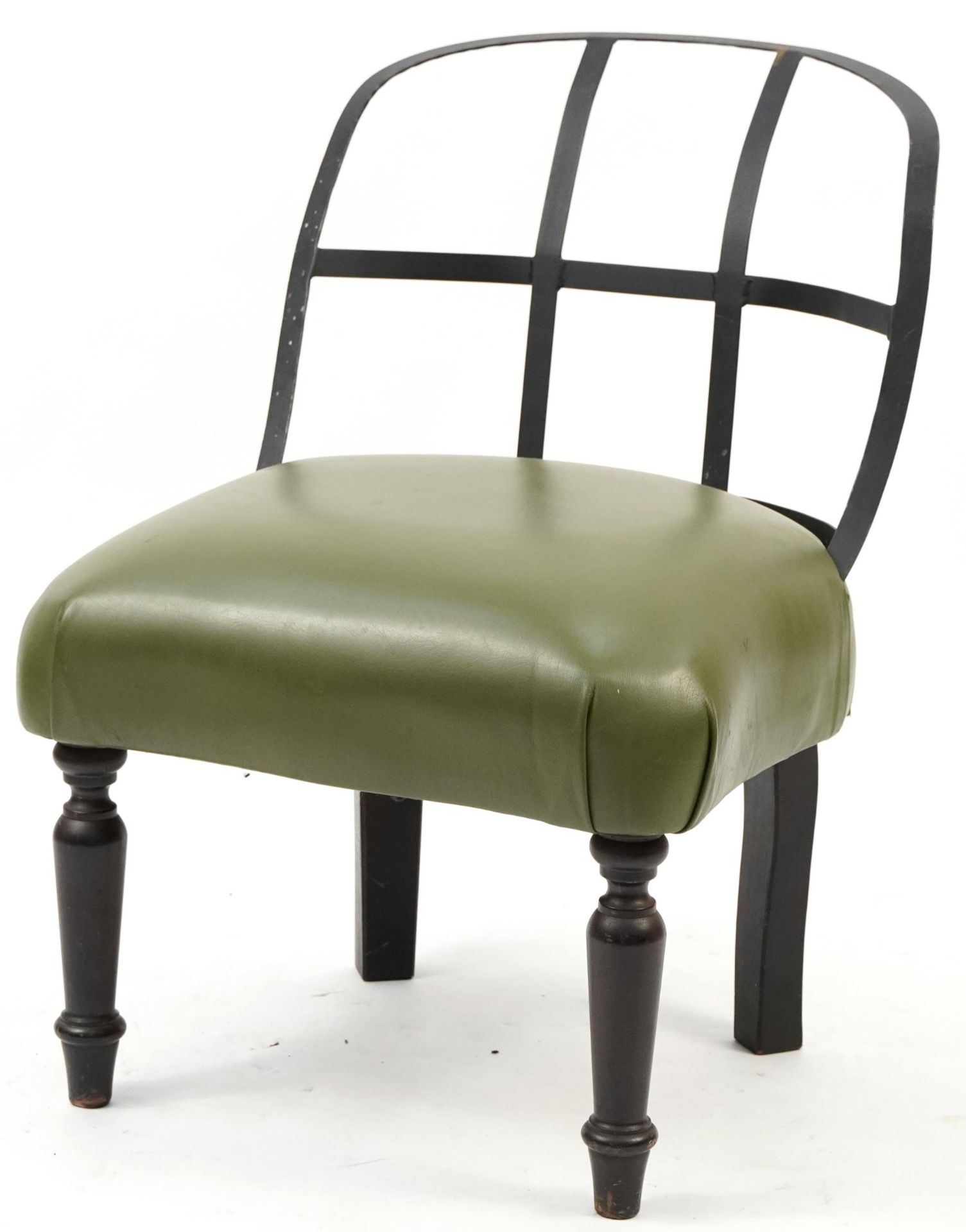 Industrial style wrought iron chair with green leather upholstered seat on turned mahogany legs,