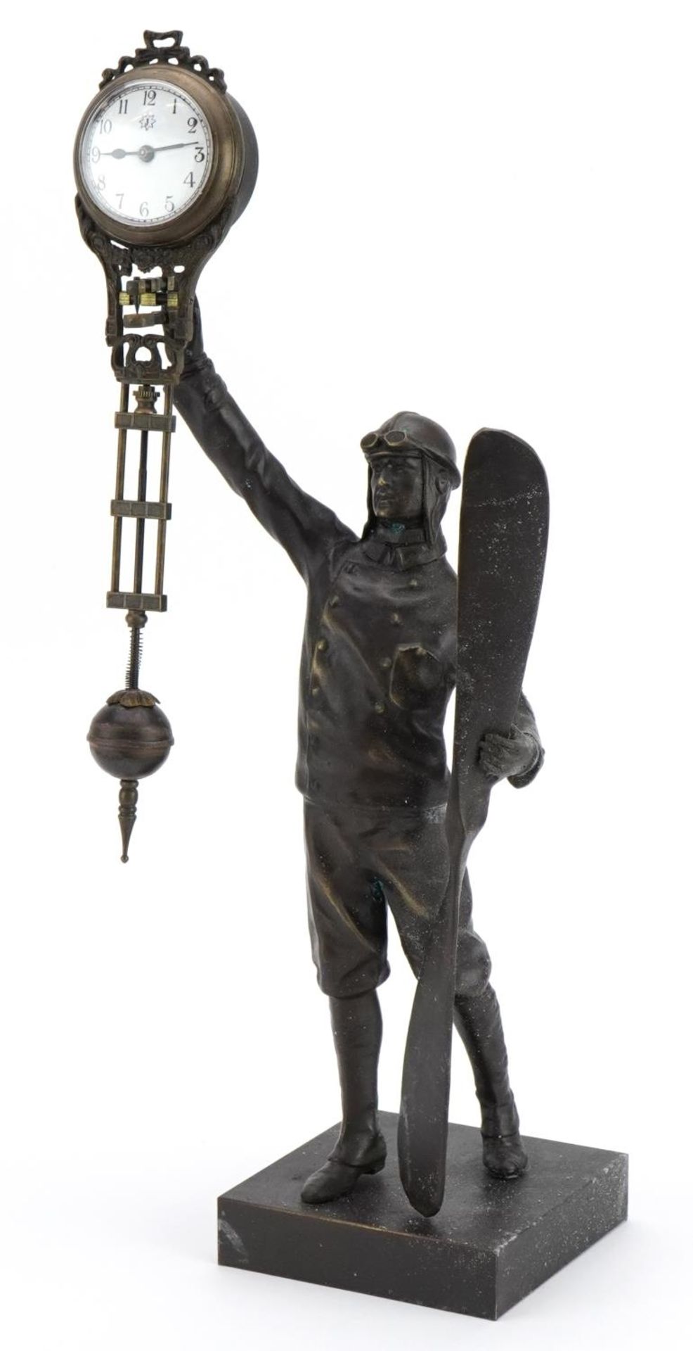 Patinated bronze military interest mystery clock in the form of a pilot, 38cm high