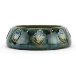 Royal Doulton Art Nouveau stoneware dish hand painted with stylised flowers, numbered B312 to the