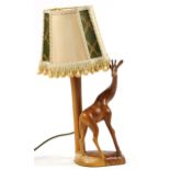 African carved wood table lamp with shade in the form of a giraffe, 48cm high
