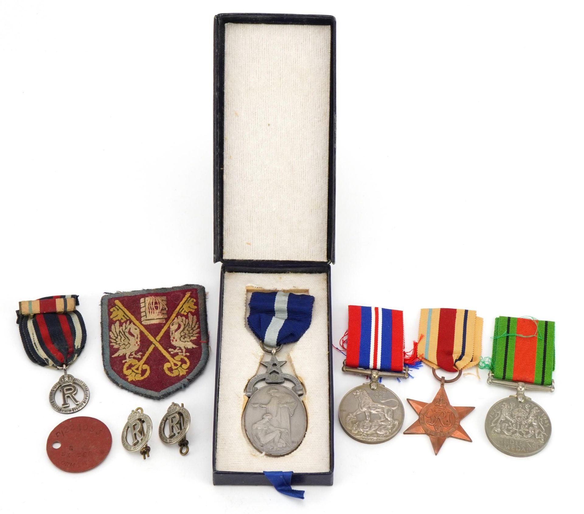 British military World War II medal group including masonic medal awarded to W Bro J M Norman, three