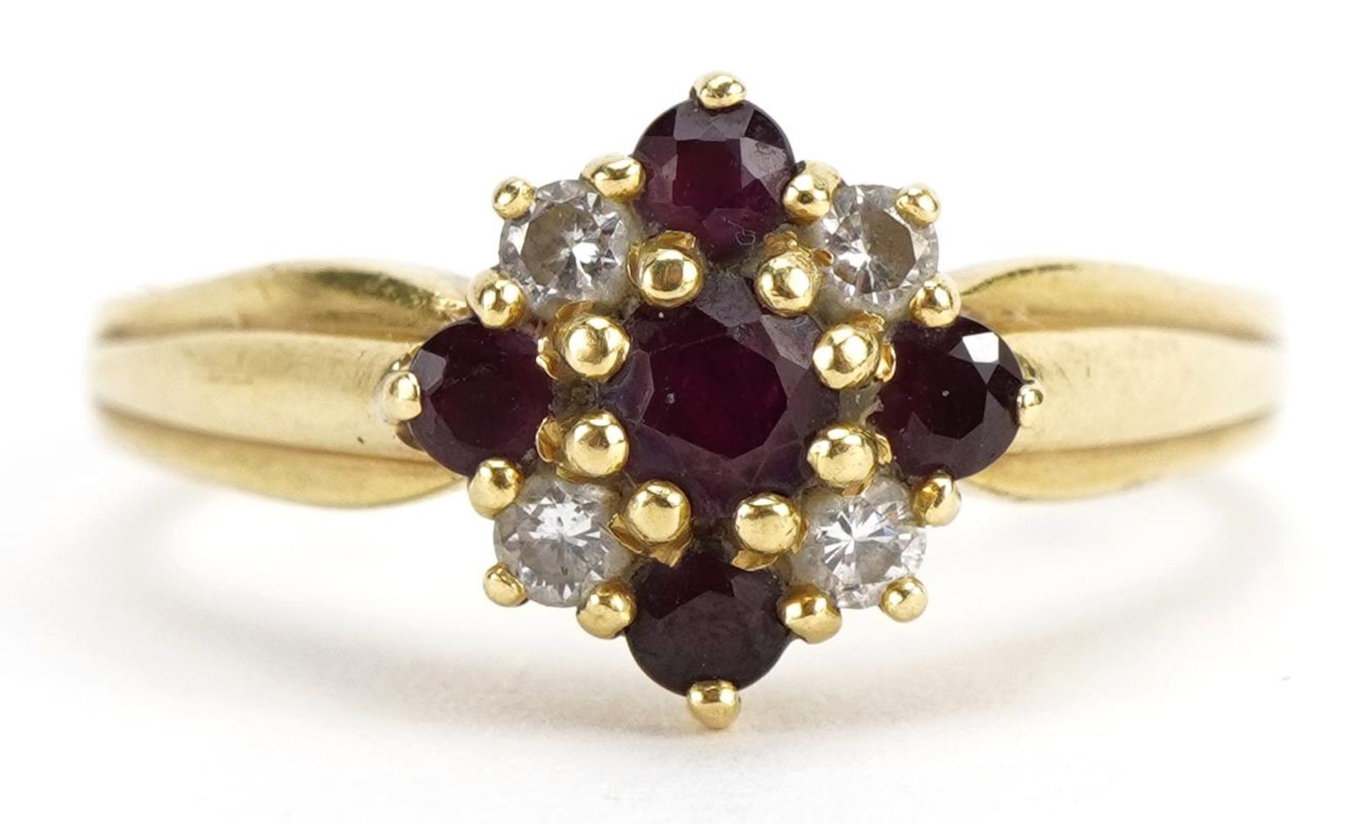 18ct gold ruby and diamond cluster ring, size P/Q, 4.9g